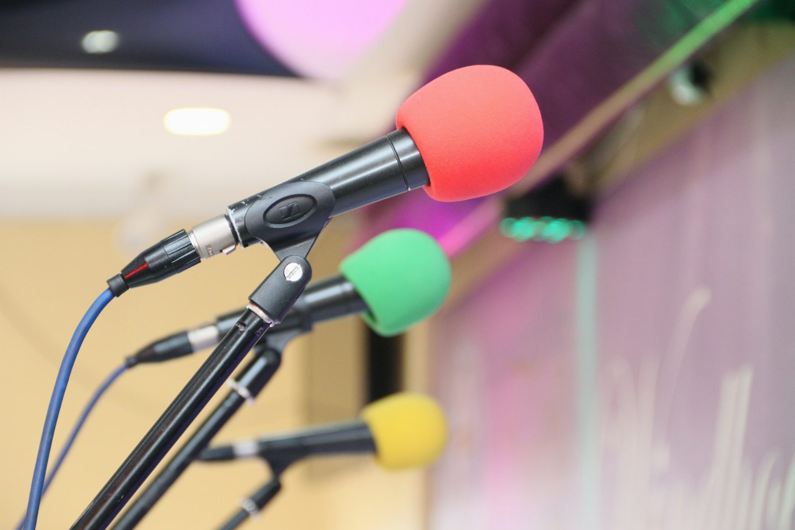 Press conference microphones minister announces reform